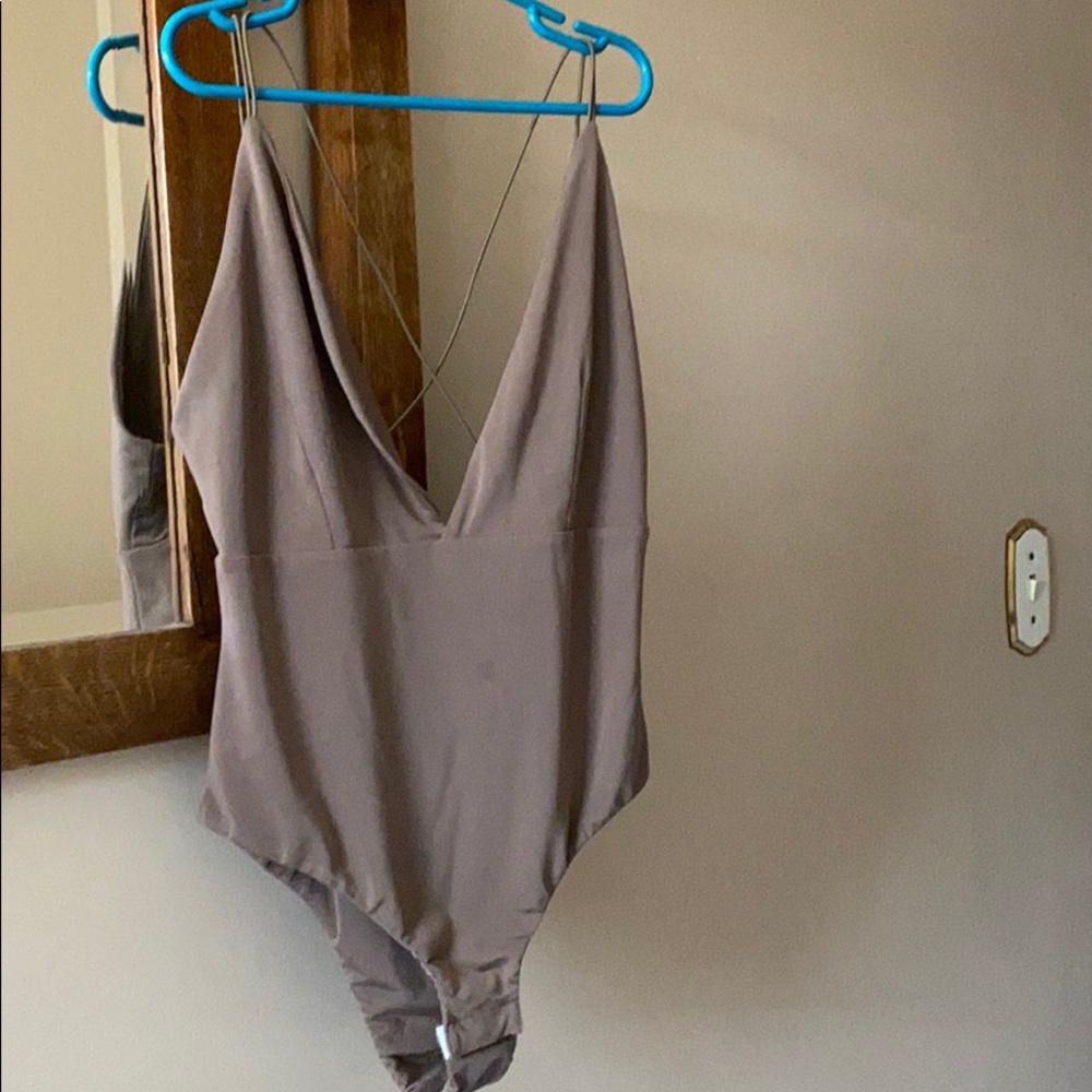 Plunge neck solid bodysuit